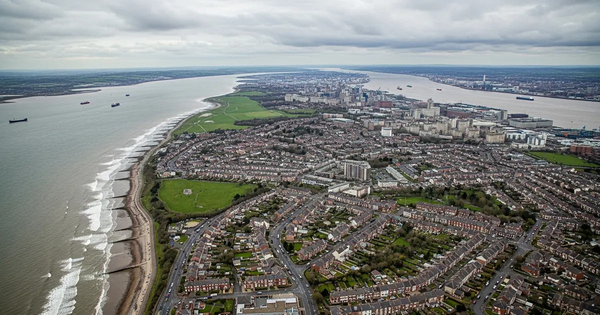 Aerial view of the Wirral Peninsula showing residential areas near the River Mersey